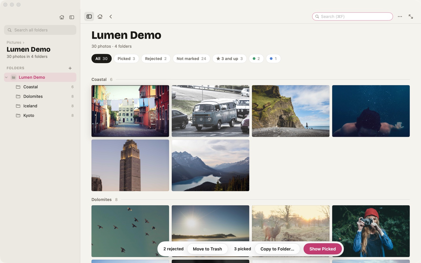 Lumen's folder tree beside a grid of every photo inside, grouped by folder